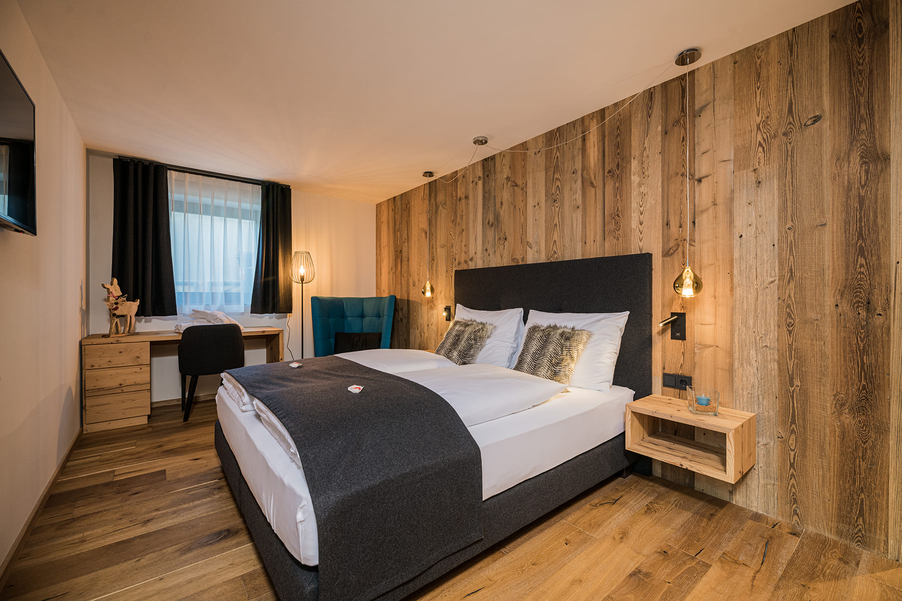 Chalet Ortles - Schlafzimmer in der Ferienwohnung mit Doppelbett